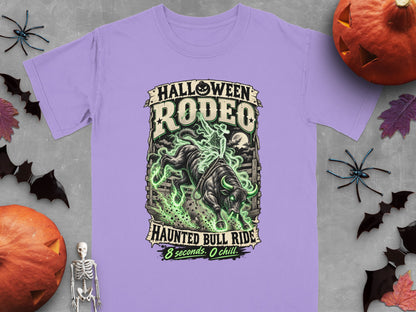Halloween Rodeo design with a bull rider on a bull surrounded by green smoke.