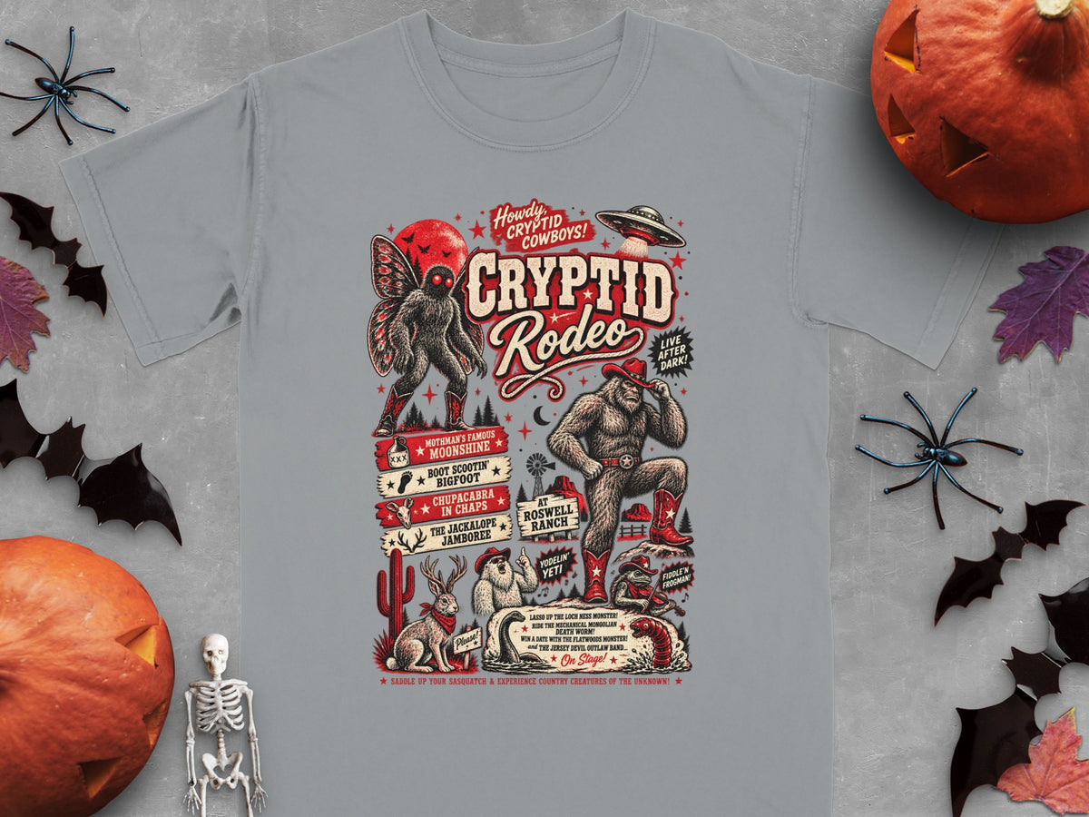 Cryptid Rodeo t-shirt features Mothman, Bigfoot, UFO, and other mythical creatures.