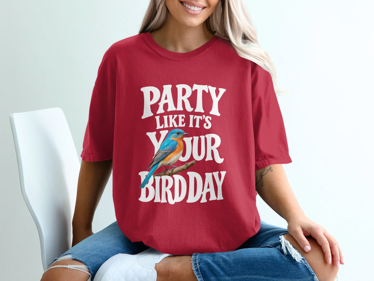 Red t-shirt with white text "PARTY LIKE IT'S YOUR BIRD DAY" and a blue bird graphic.