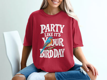 Red t-shirt with white text "PARTY LIKE IT'S YOUR BIRD DAY" and a blue bird graphic.