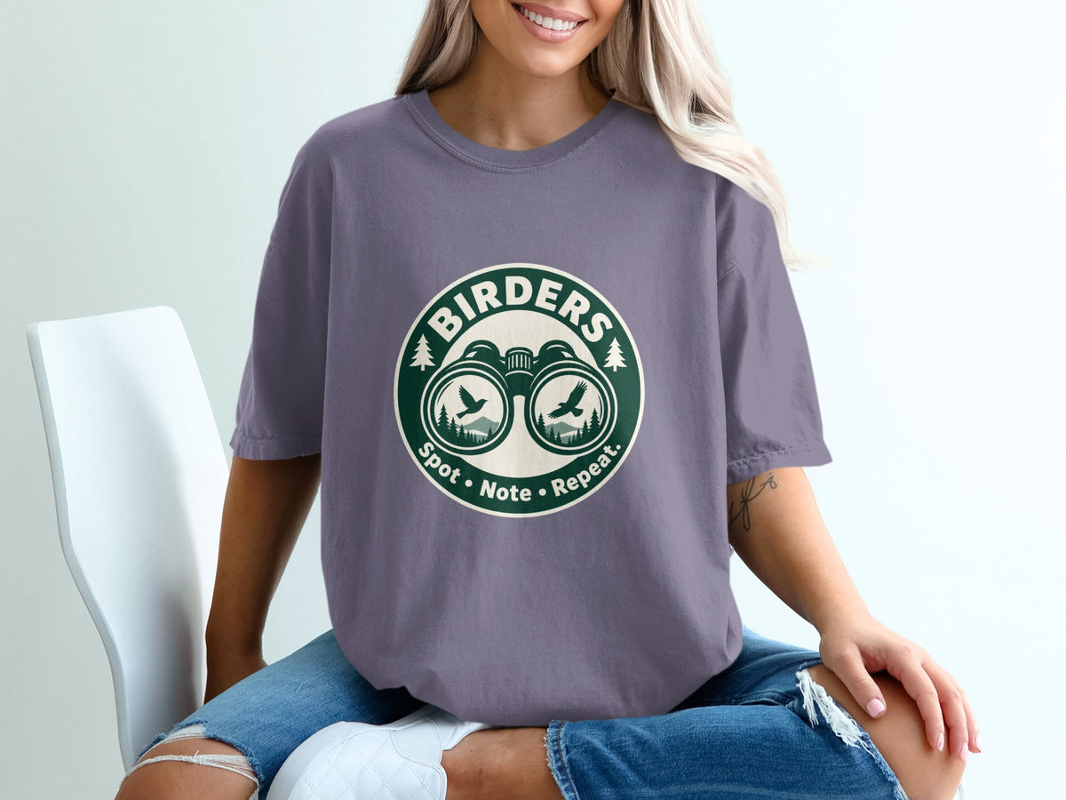 T-shirt with "Birders Spot Note Repeat" logo featuring binoculars and birds.