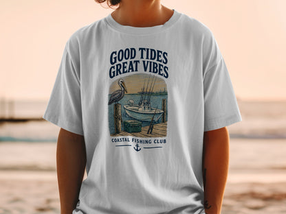 T-shirt with "Good Tides Great Vibes Coastal Fishing Club" graphic and nautical scene.