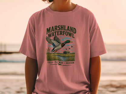 T-shirt with "Marshland Waterfowl" graphic featuring a mallard duck in flight.
