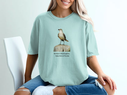 Light blue t-shirt with Northern Mockingbird, State Bird of Florida graphic.