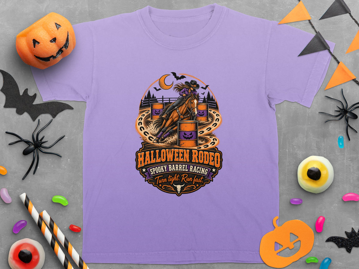 Purple t-shirt with Halloween Rodeo graphic of barrel racing and text.
