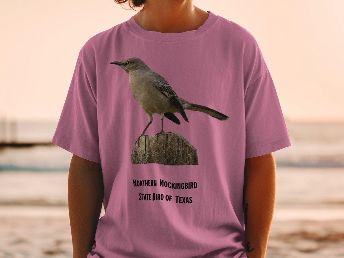 Northern Mockingbird, State Bird of Texas graphic on pink t-shirt