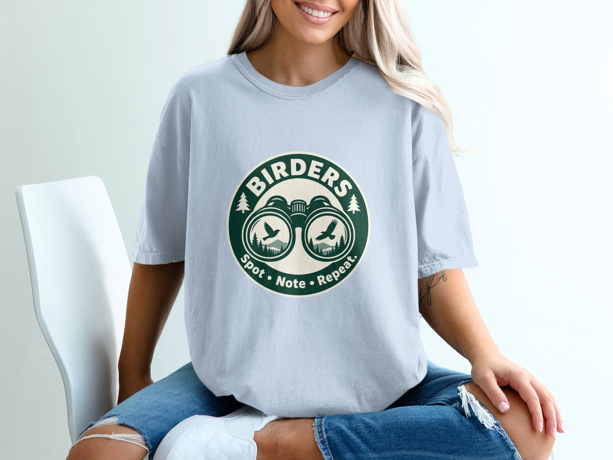 T-shirt with "Birders Spot Note Repeat" text and binoculars graphic.