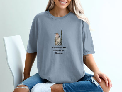 Light blue t-shirt featuring a Northern Flicker, the State Bird of Alabama.