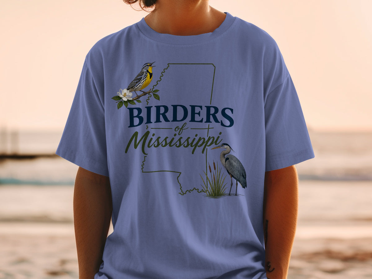 Blue t-shirt with "Birders of Mississippi" text and two bird illustrations.