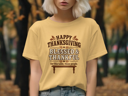 Yellow t-shirt with "Happy Thanksgiving Blessed & Thankful" text and a table.