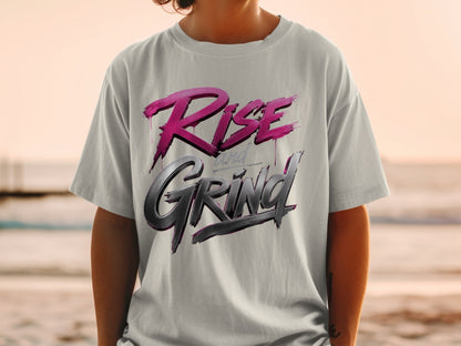 Light grey t-shirt with metallic pink "Rise" and grey "Grind" text.