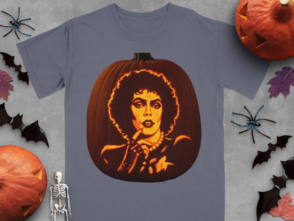 A gray t-shirt featuring a glowing carved pumpkin portrait of Frank-N-Furter surrounded by Halloween decorations.