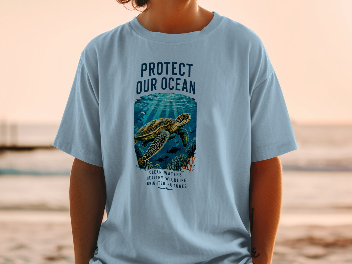 Light blue t-shirt with "Protect Our Ocean" graphic featuring a sea turtle.