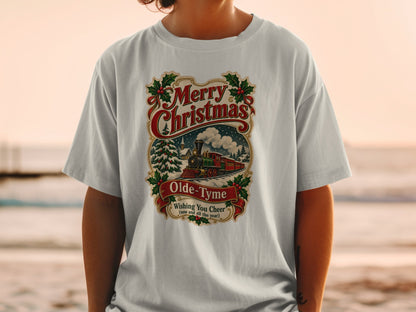 T-shirt with vintage Merry Christmas train design and holly accents.