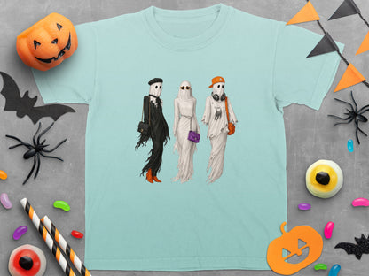 T-shirt with three fashionable ghosts and Halloween-themed decorations.