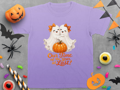 Purple t-shirt with two ghosts hugging a pumpkin and text "Our Time of the Year, at Last!".