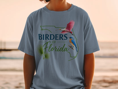 T-shirt with "Birders of Florida" text and illustrations of birds and palm fronds.