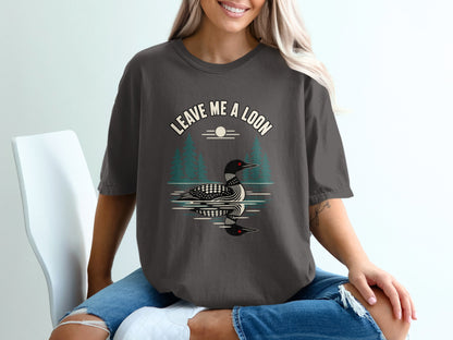 T-shirt with "Leave Me a Loon" text and loon reflection graphic.