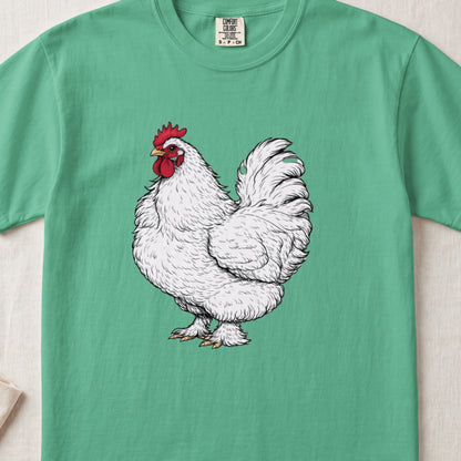 A bright green t-shirt featuring a detailed illustration of a fluffy white rooster on the chest.