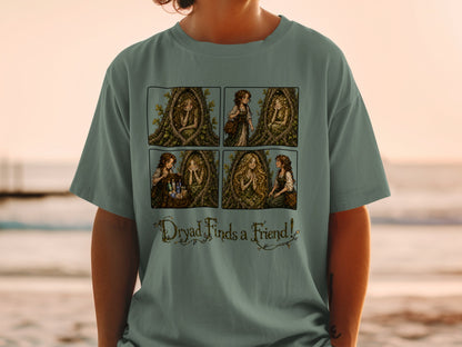 Four panel comic on shirt shows a dryad in a tree and "Dryad Finds a Friend!" text.