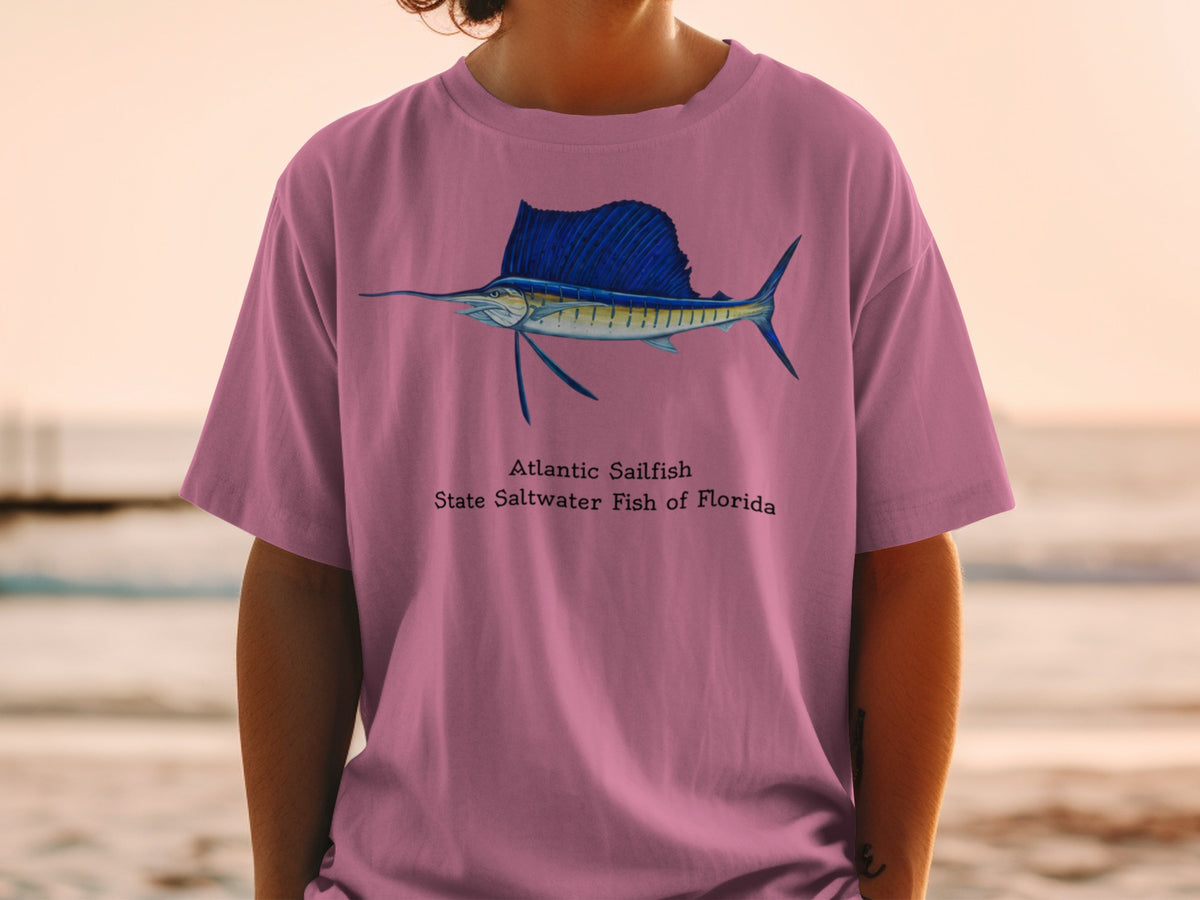 Pink t-shirt with an Atlantic Sailfish illustration and text.