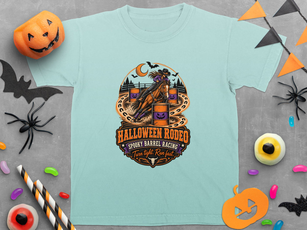 Halloween Rodeo design with horse and rider, orange barrels, and text.