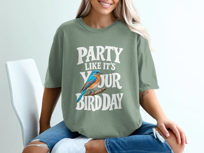 Green t-shirt with "Party Like It's Your Bird Day" text and a bluebird graphic.