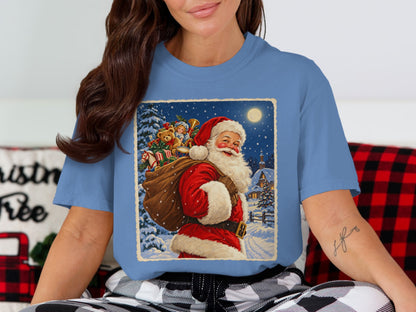 Santa Claus with a sack of toys on his back in a snowy village scene.