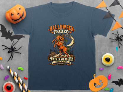 Blue t-shirt with "Halloween Rodeo Pumpkin Wrangler" graphic of a pumpkin horse.