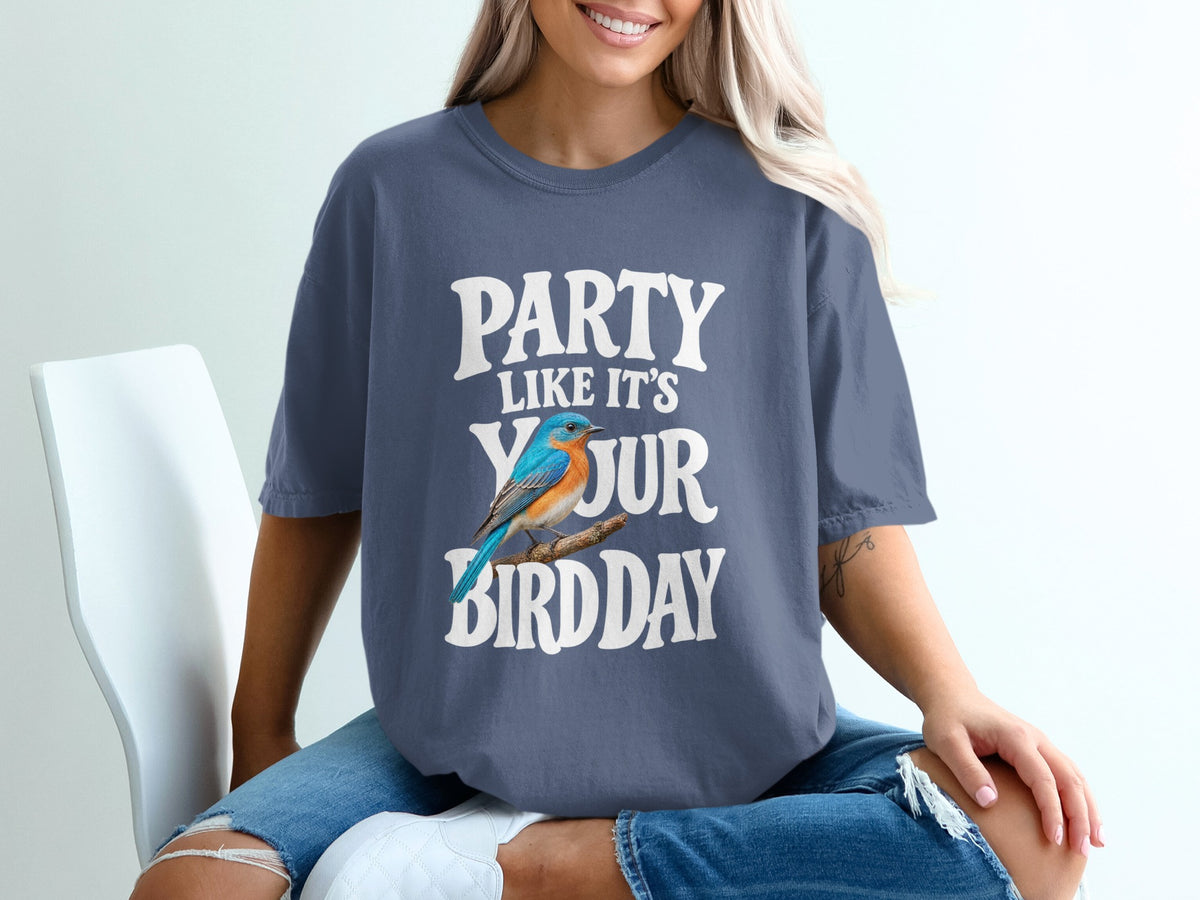 Bluebird graphic with "Party Like It's Your Birthday" text on a dark blue t-shirt.