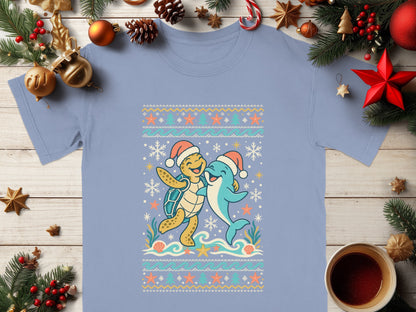 Turtle and dolphin wearing Santa hats with a winter ocean theme.