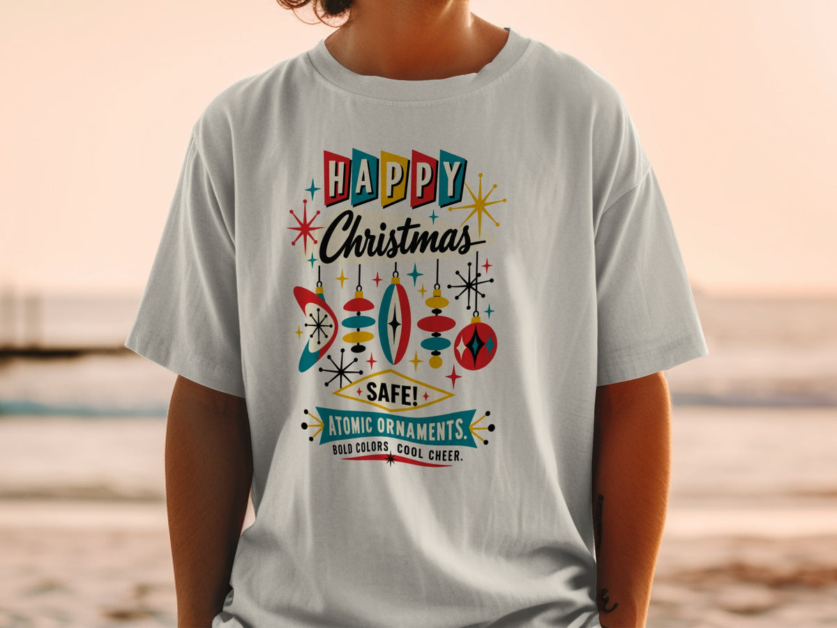 T-shirt with "Happy Christmas Atomic Ornaments" text and retro Christmas ornaments.
