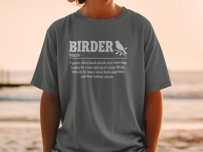 Dark grey t-shirt with white text defining "BIRDER" and a bird illustration.