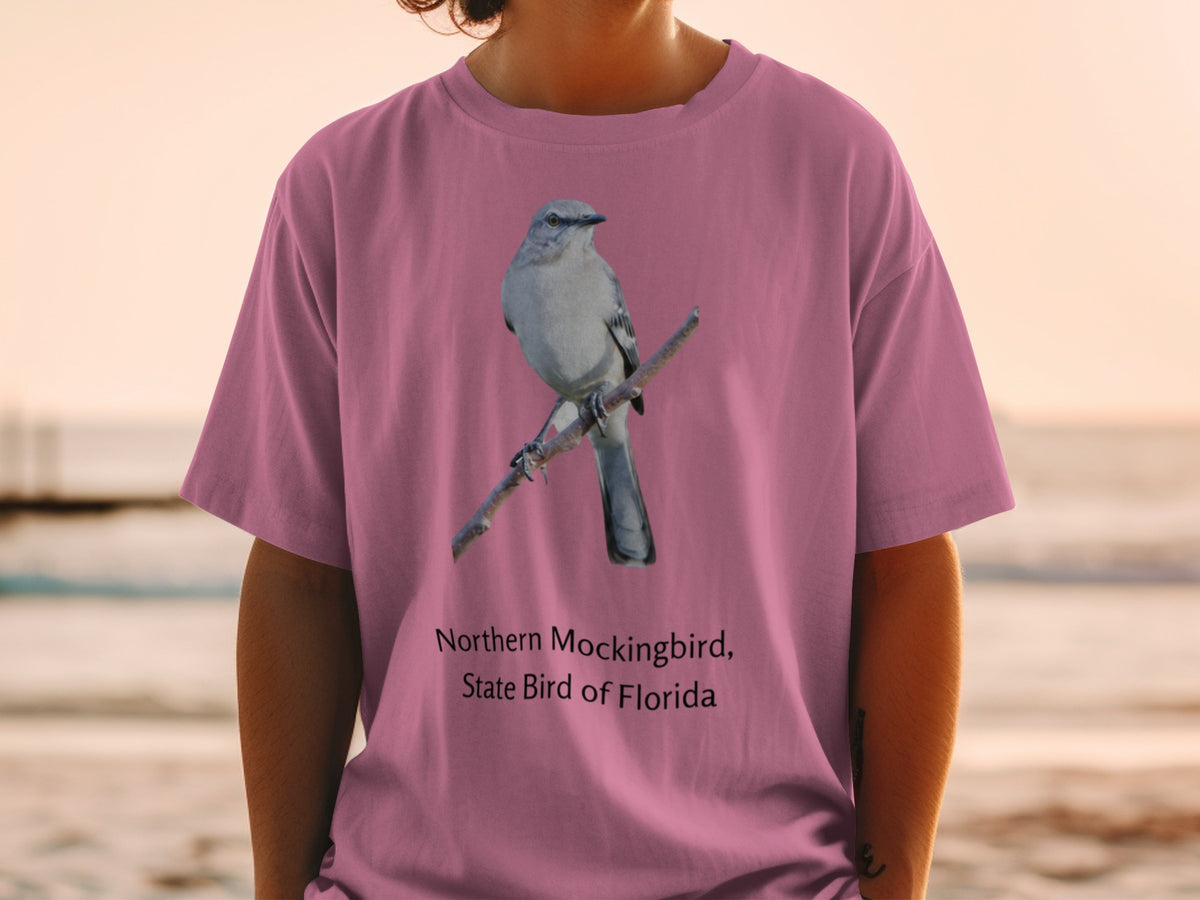 Northern Mockingbird, State Bird of Florida graphic on pink t-shirt.