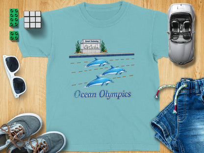 T-shirt with cartoon dolphins swimming and "Ocean Olympics" text.