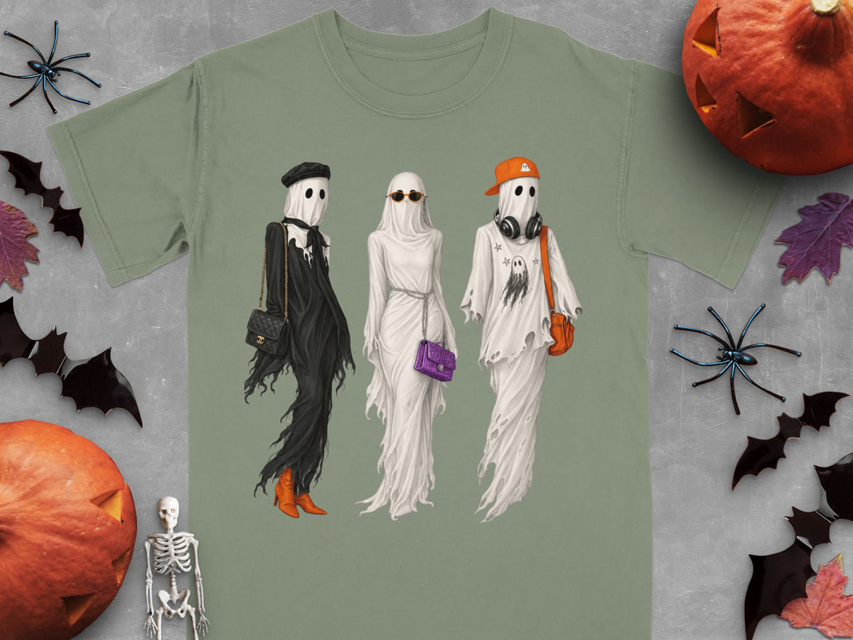 Three ghosts in fashion outfits with accessories, on a t-shirt.