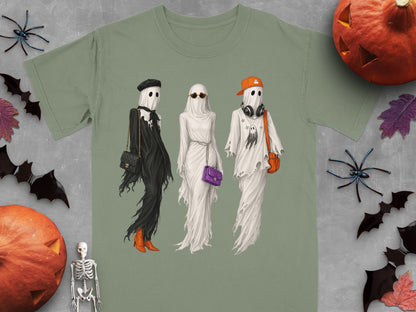 Three ghosts in fashion outfits with accessories, on a t-shirt.