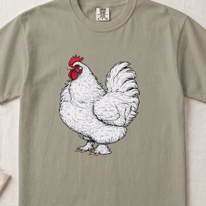 An olive-green t-shirt featuring an illustration of a white rooster with a red comb and wattle.