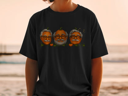 T-shirt with three pumpkins wearing glasses and mustaches on a beach background.
