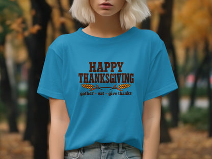 Blue t-shirt with "Happy Thanksgiving gather eat give thanks" text.