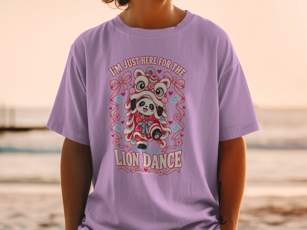 Panda in a lion dance costume on a purple t-shirt with "I'M JUST HERE FOR THE LION DANCE" text.