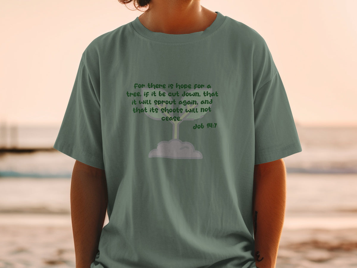 Green t-shirt with text from Job 14:7 and a sprout graphic.