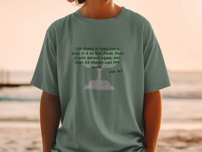 Green t-shirt with text from Job 14:7 and a sprout graphic.