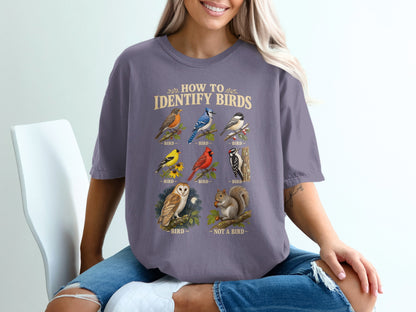 T-shirt graphic with "How to Identify Birds" text and illustrations of birds and a squirrel.