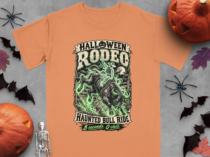 Orange t-shirt with Halloween Rodeo Haunted Bull Ride graphic.