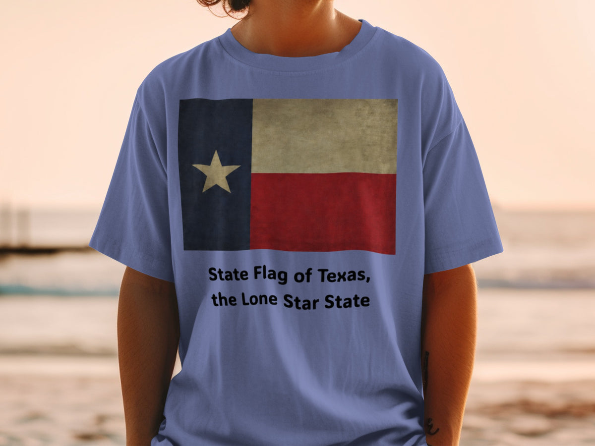 Blue t-shirt with vintage Texas flag graphic and text.