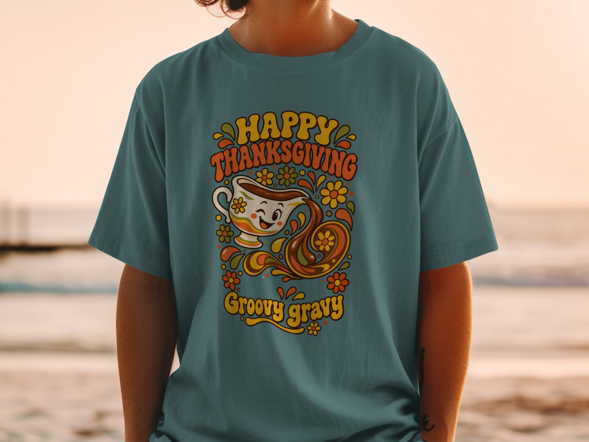 T-shirt with "Happy Thanksgiving Groovy Gravy" text and a smiling gravy boat graphic.
