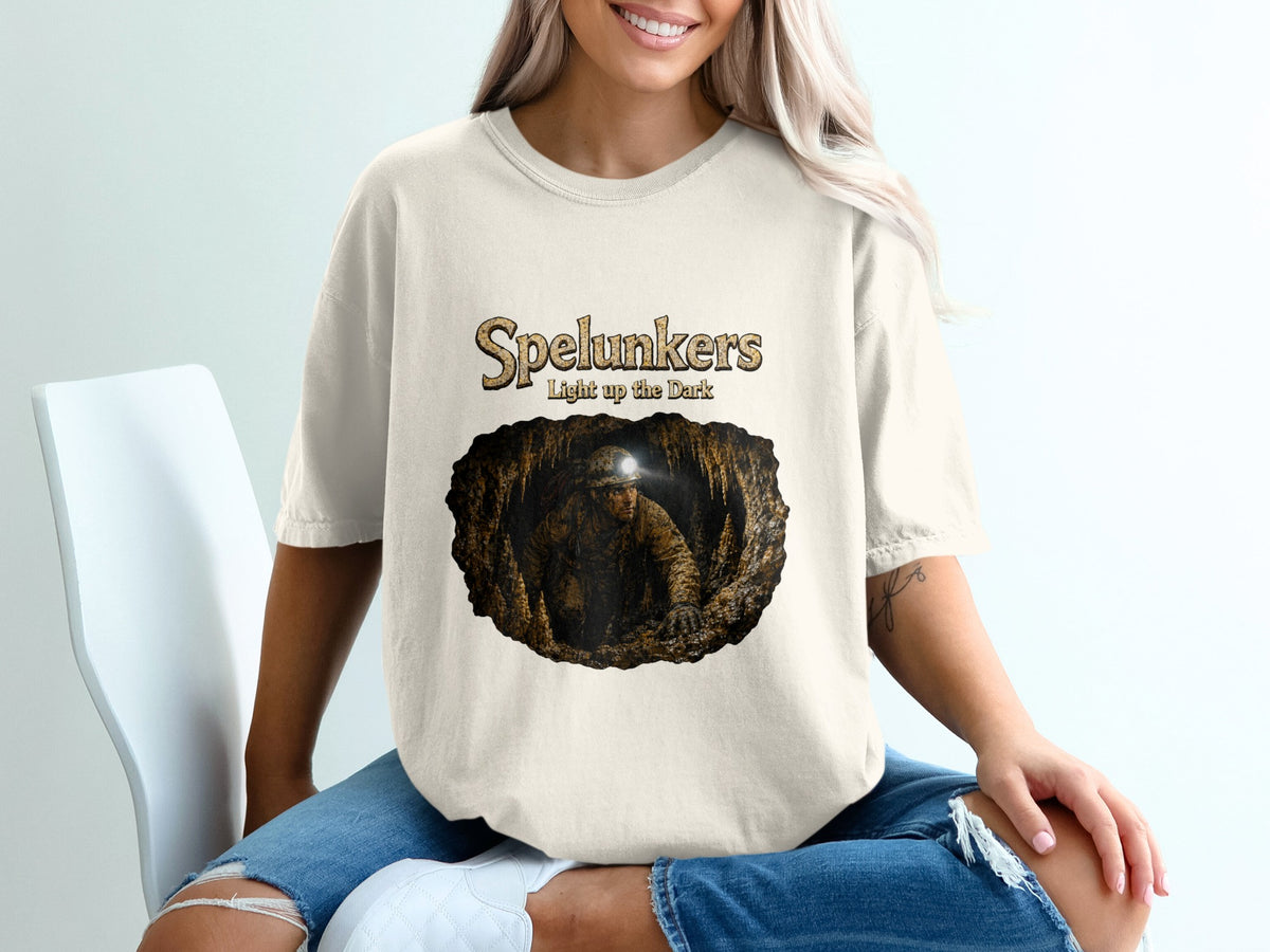 Spelunkers Light up the Dark t-shirt with cave explorer graphic.