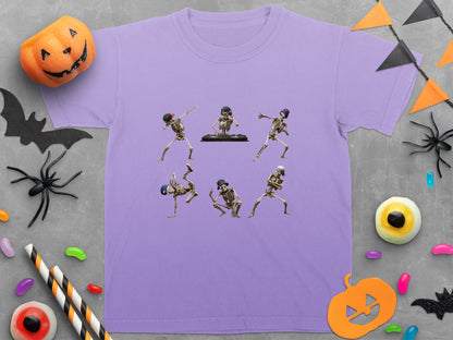 Purple t-shirt with six dancing skeletons and Halloween decorations.