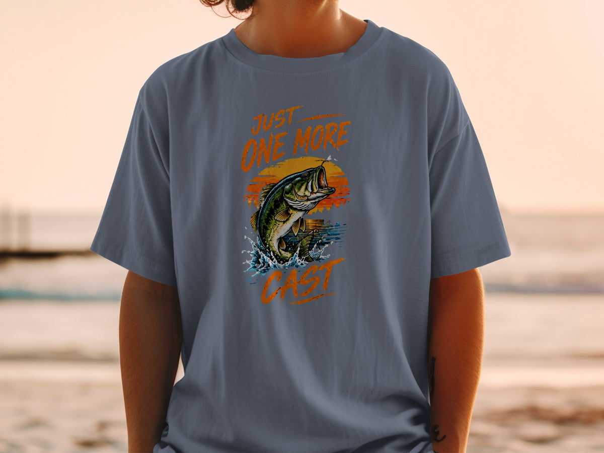 T-shirt with jumping bass, sunset graphic, and "Just One More Cast" text.